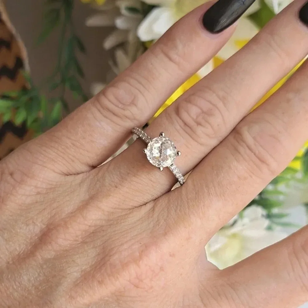 Genuine Moissanite Ring Platinum Over 925 Sterling Silver.